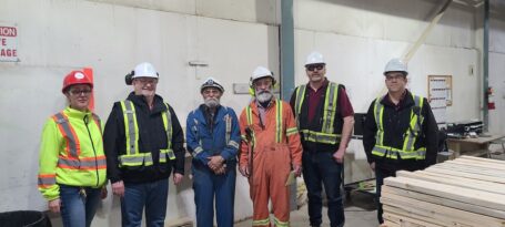 Workers at Conifex's Mackenzie sawmill