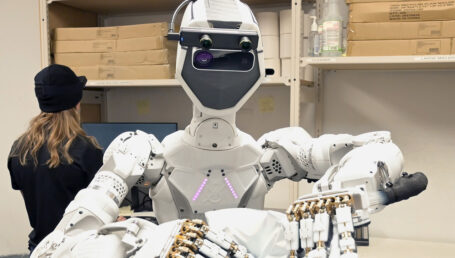 A humanoid robot deployed at a Mark's store in Langley organizes products