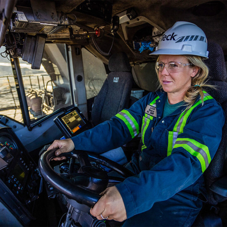 A woman driving a truck