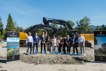 ten people in a construction site with shovels